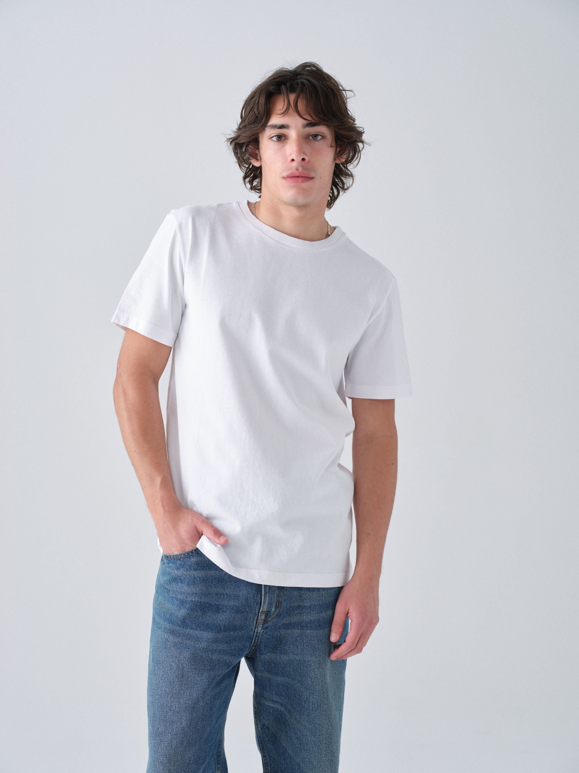 Model guy wearing Staple T-Shirt in white torso view