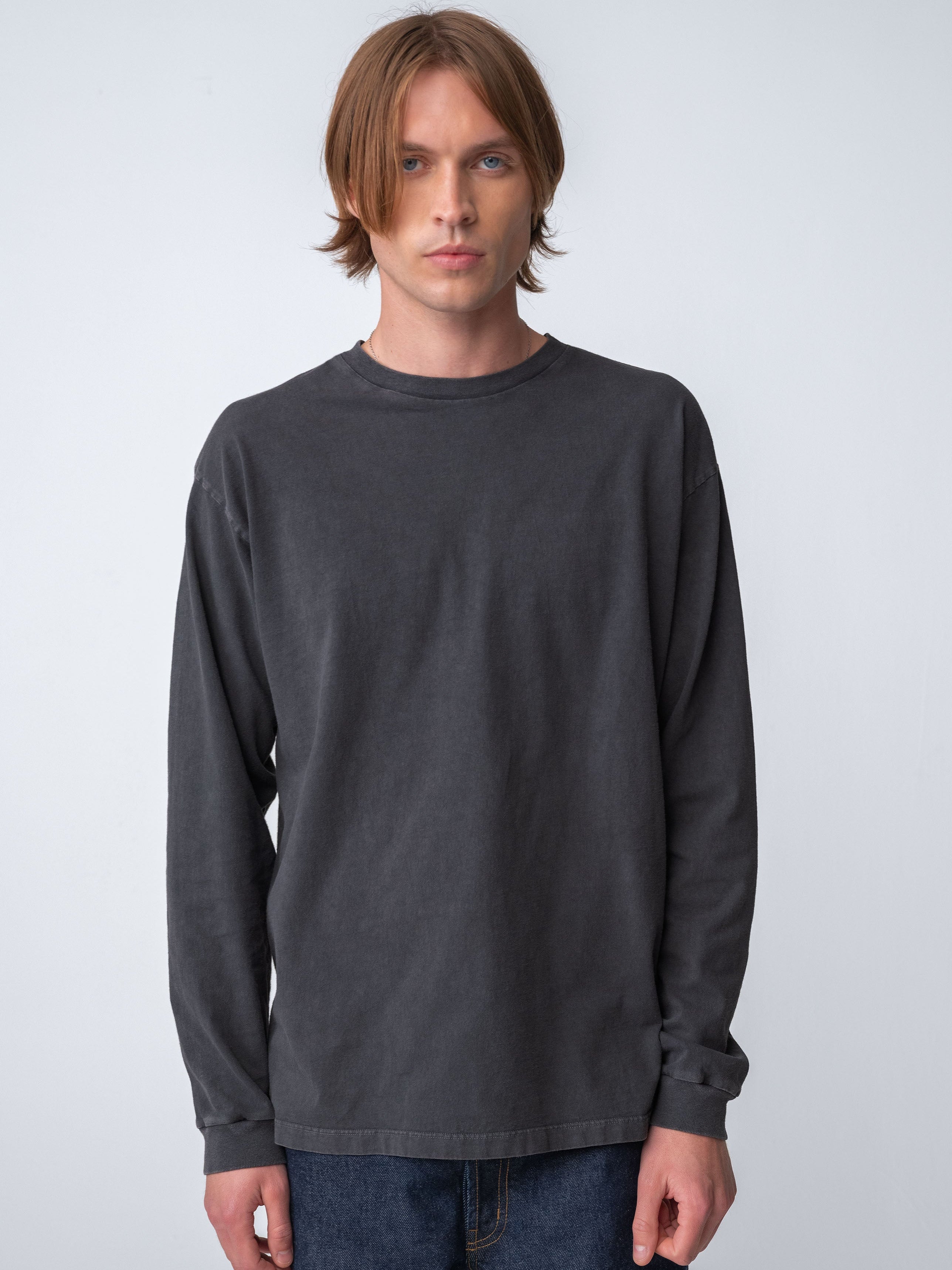 Model wearing Sunwashed Staple Long Sleeve in Charcoal Torso view