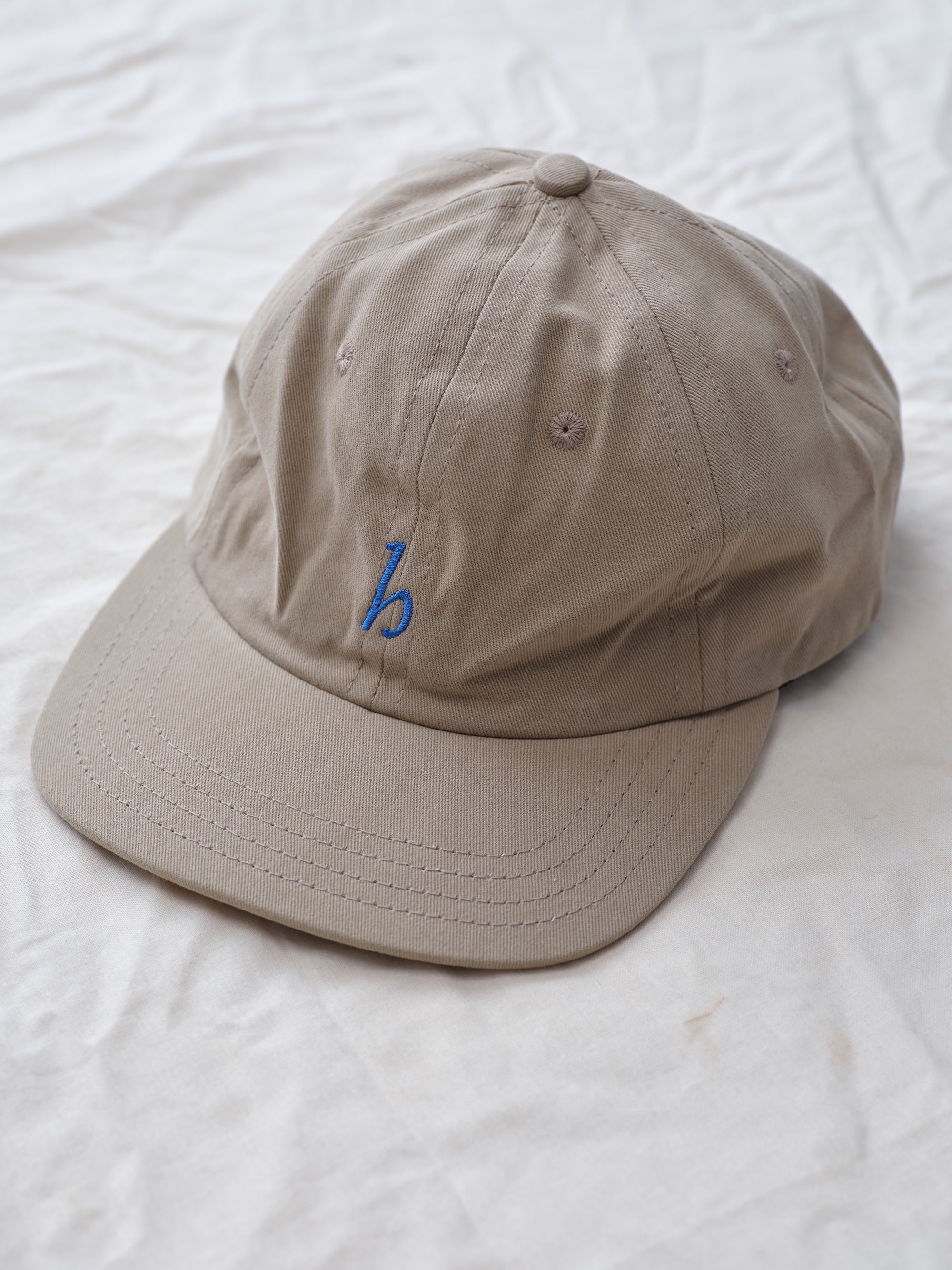 Hanover cap in khaki on textured background alternate view