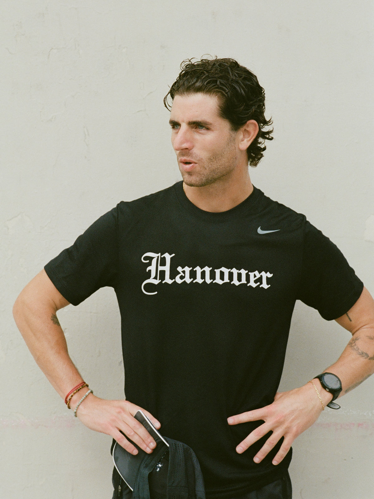Tom wears Hanover Blackletter Tee in Black