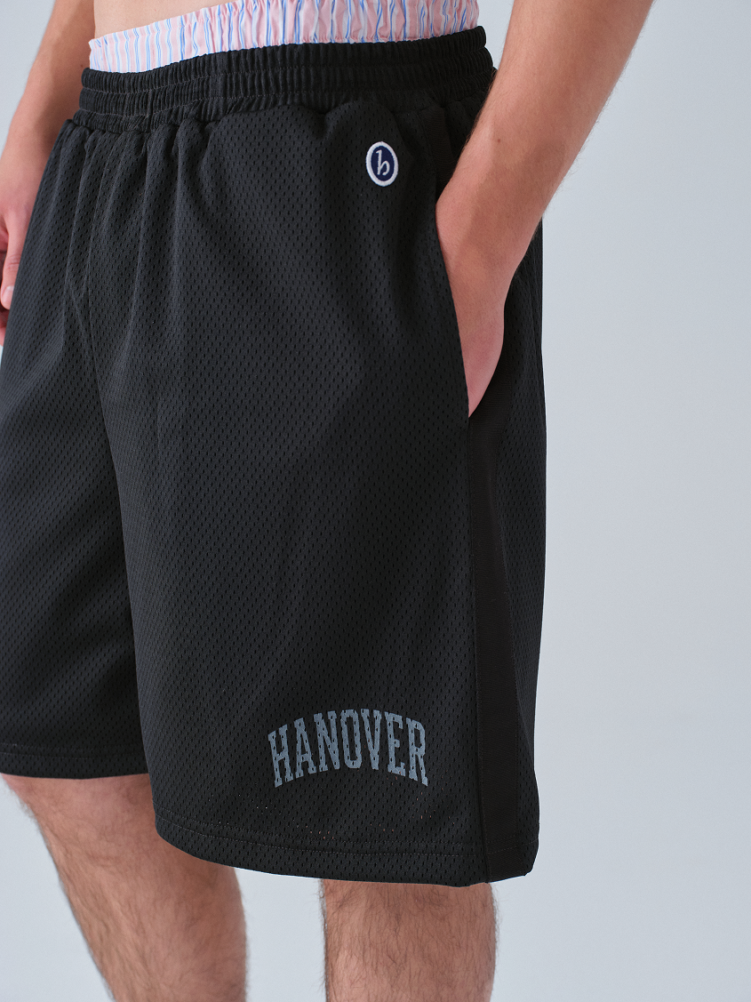 Black athletic shorts with 'Hanover' text on a plain background