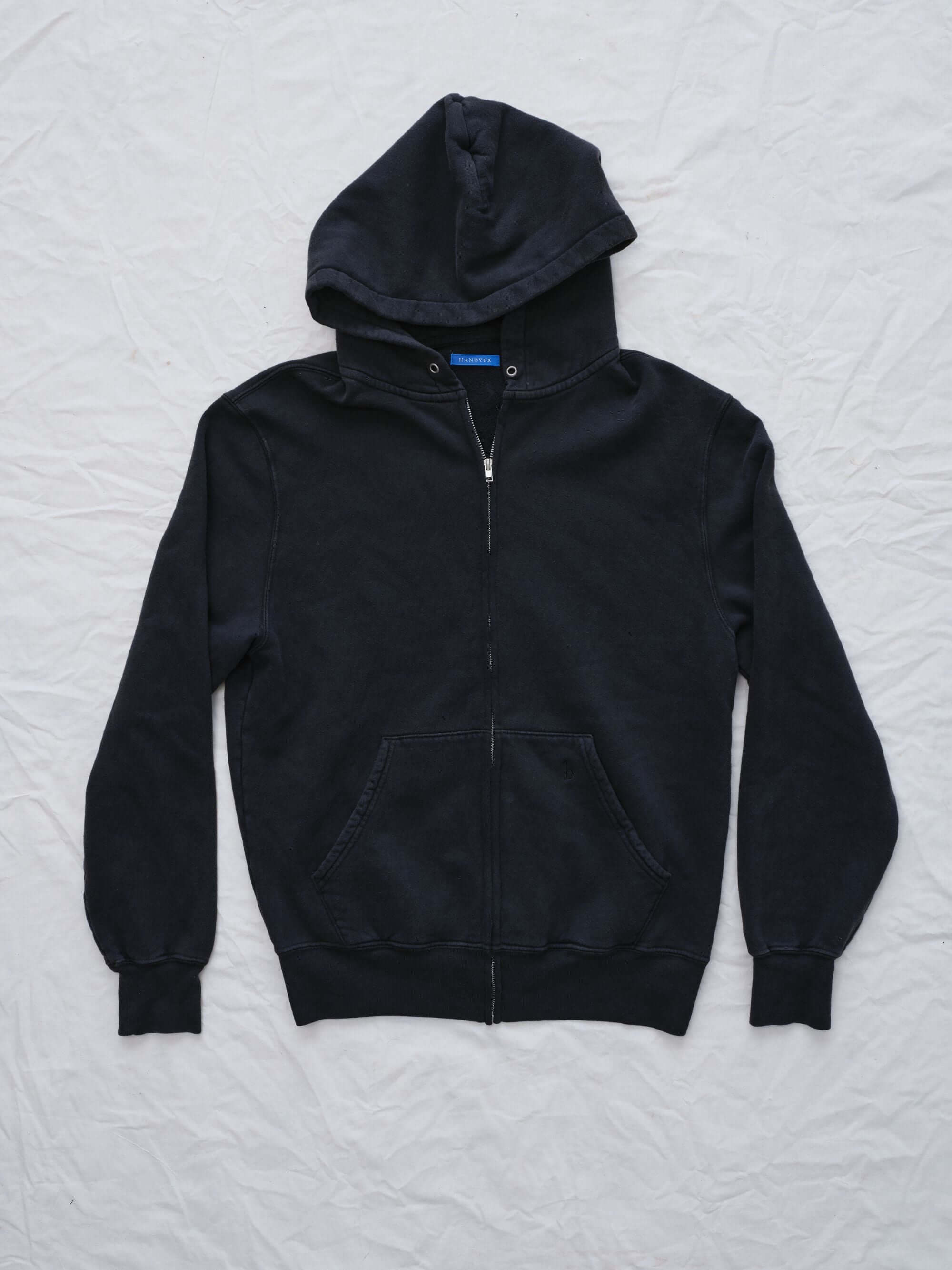 Hanover vintage Black hoodie on a textured white background