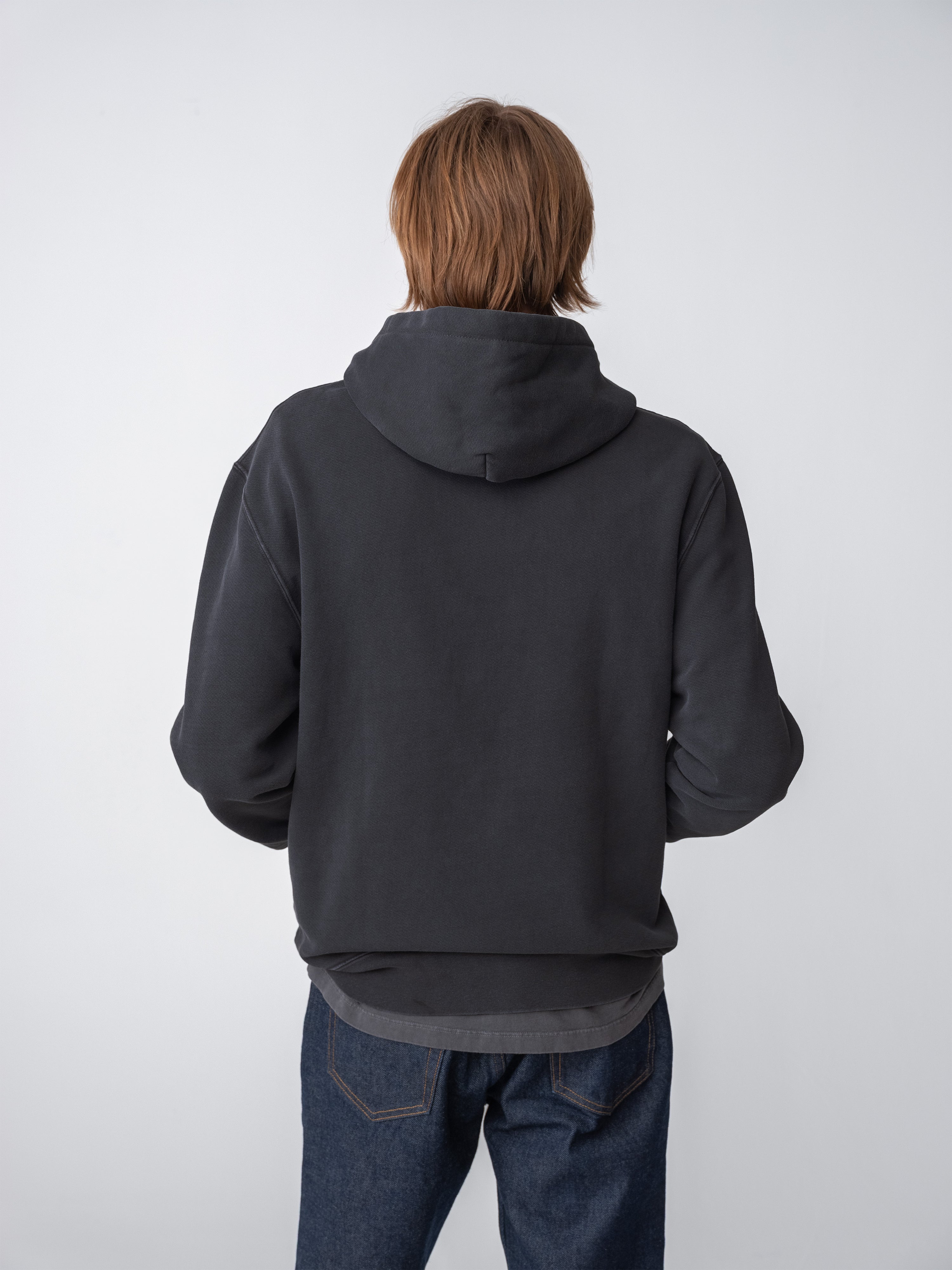 Person wearing hanover sunwashed sweatshirt charcoal