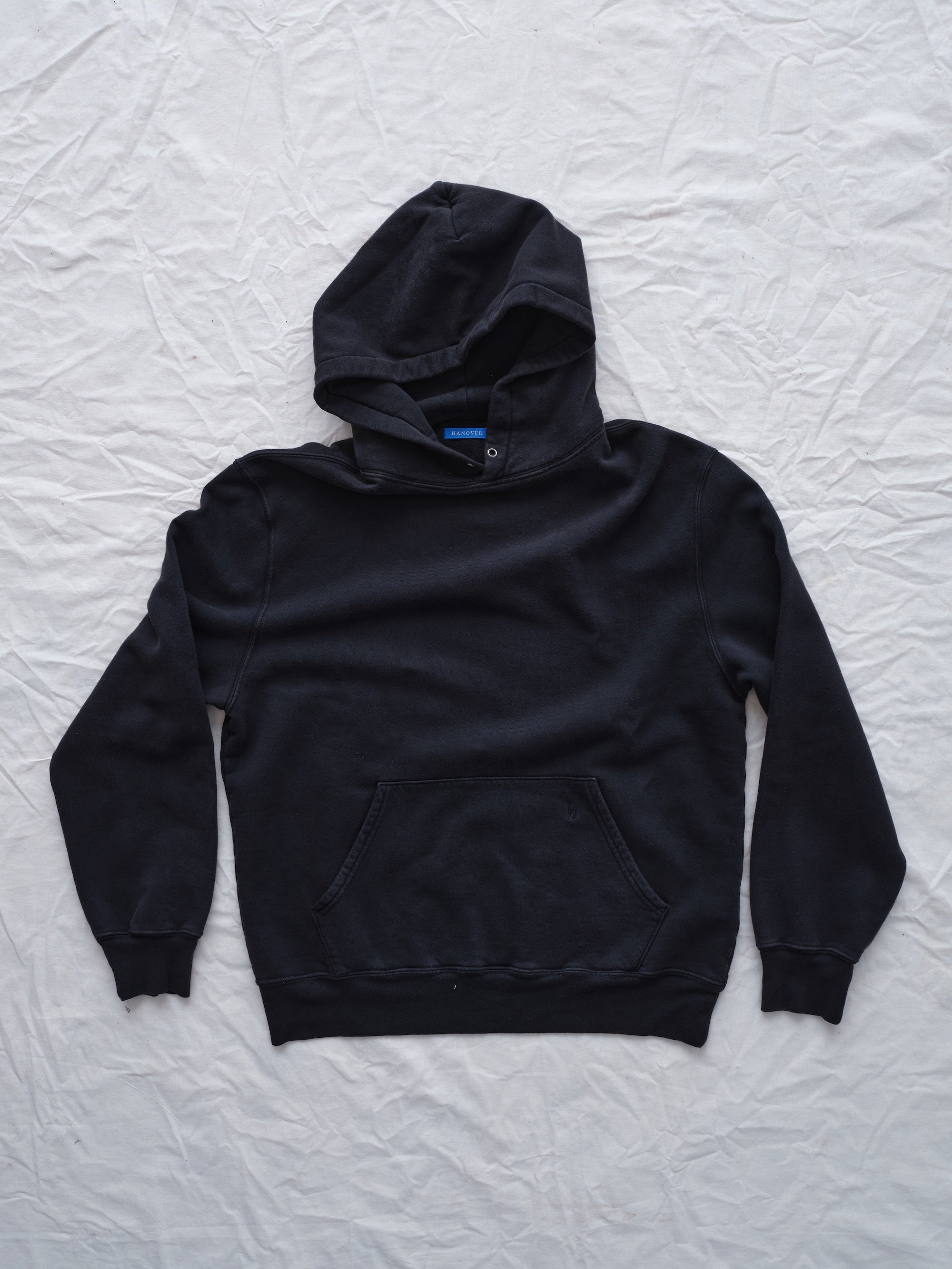 Flat lay Sunwashed Staple Hoodie in vintage black