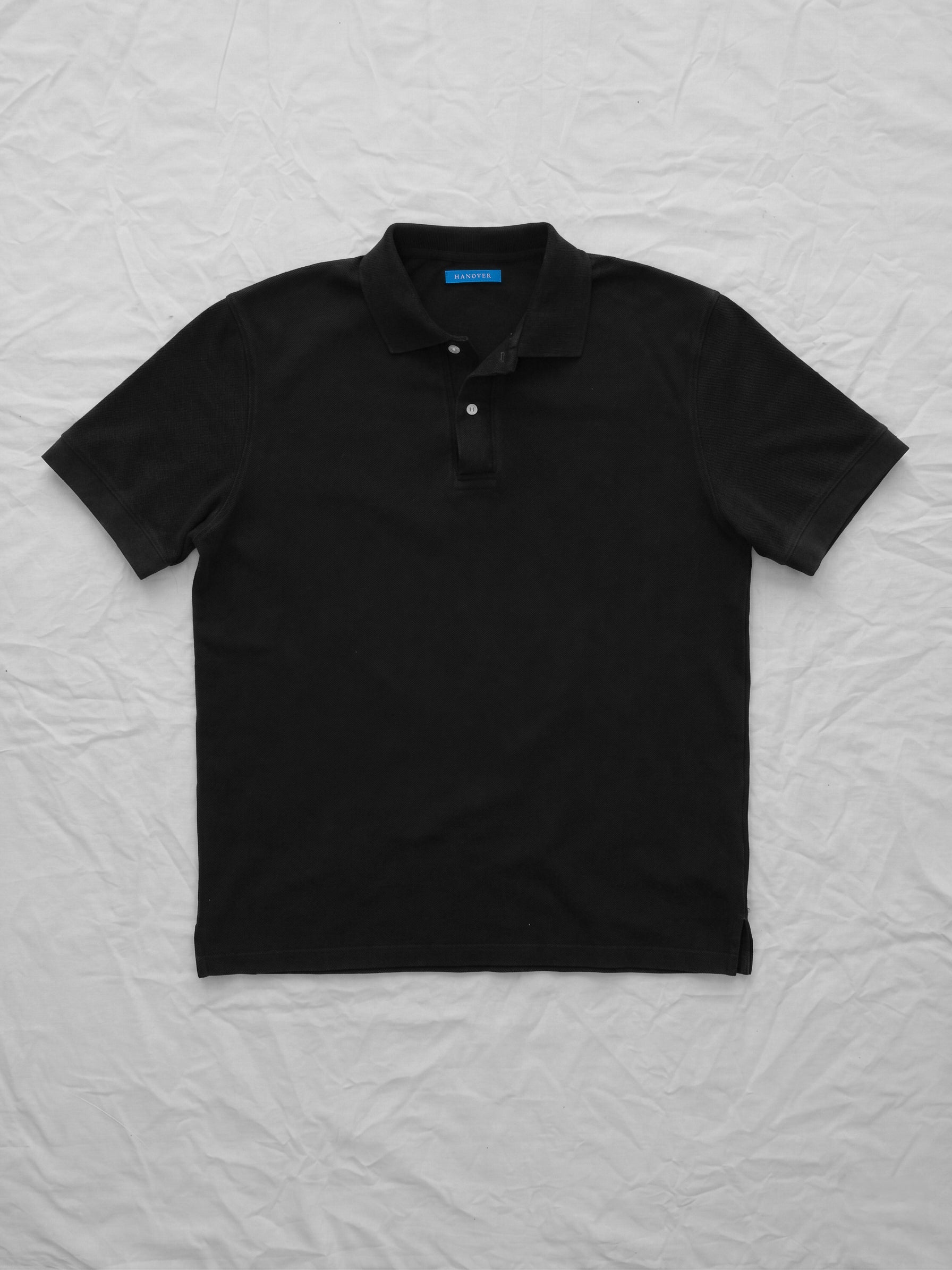 Flat lay Sunwashed Staple Polo Shirt in vintage black color