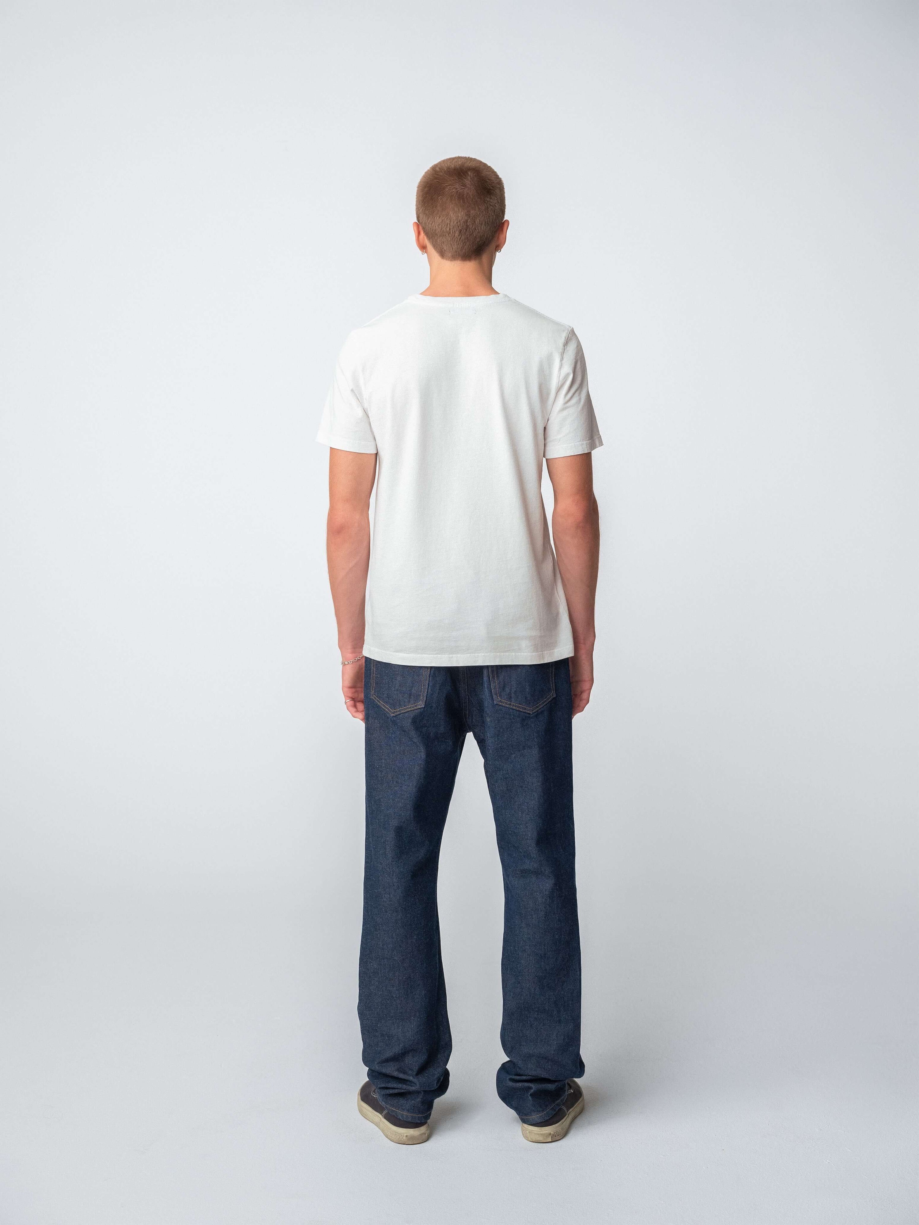 Model wearing Raw denim Drift Jeans from the back, showcasing classic straight-fit design.